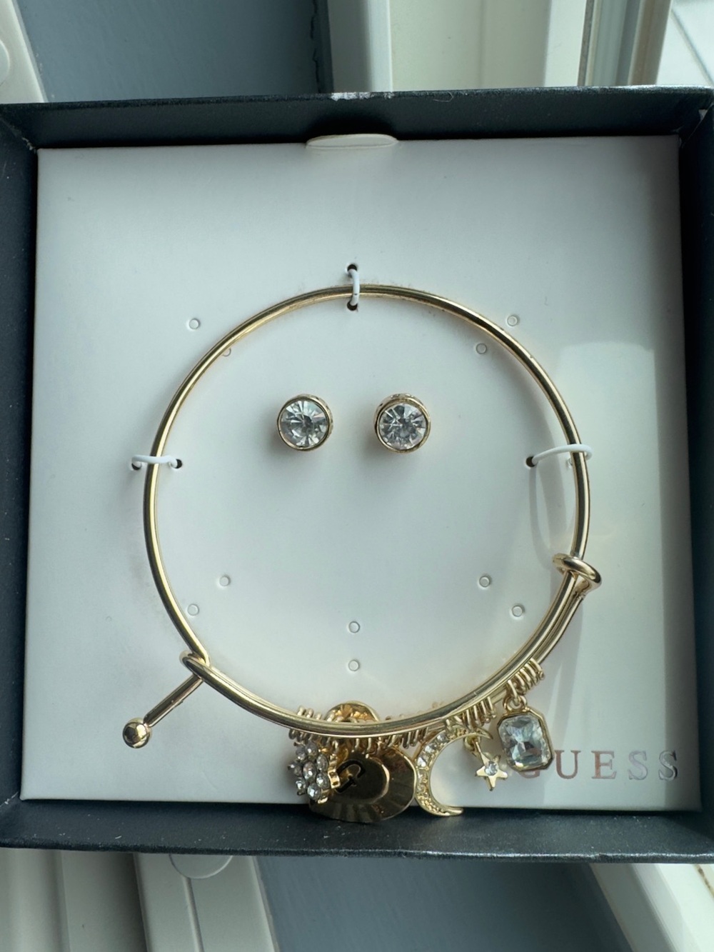 Guess Gold-Tone Charm Bangle Bracelet with Clear Crystal Studs - Picture 3 of 3